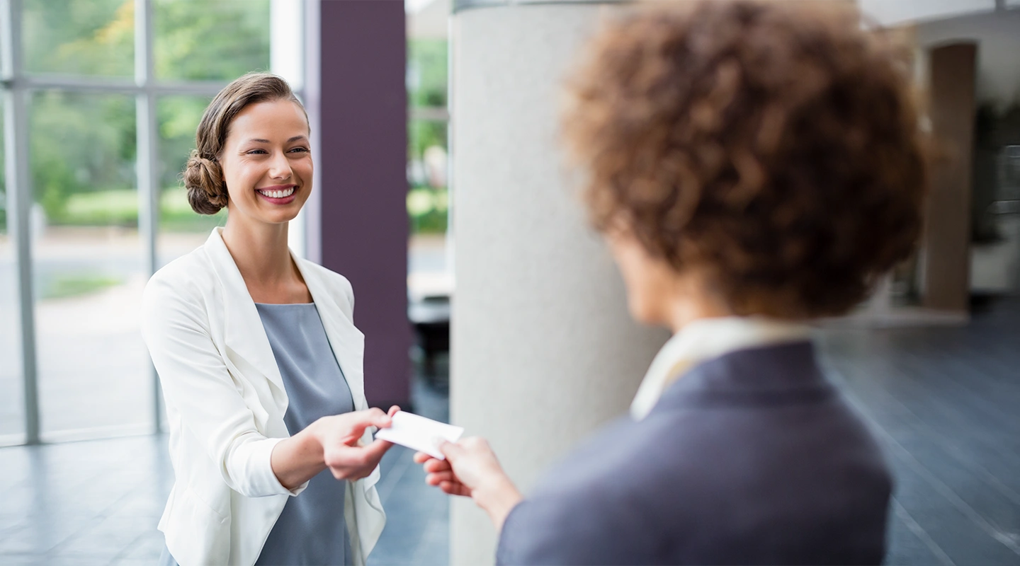 Professionals connecting at a casual networking happy hour event