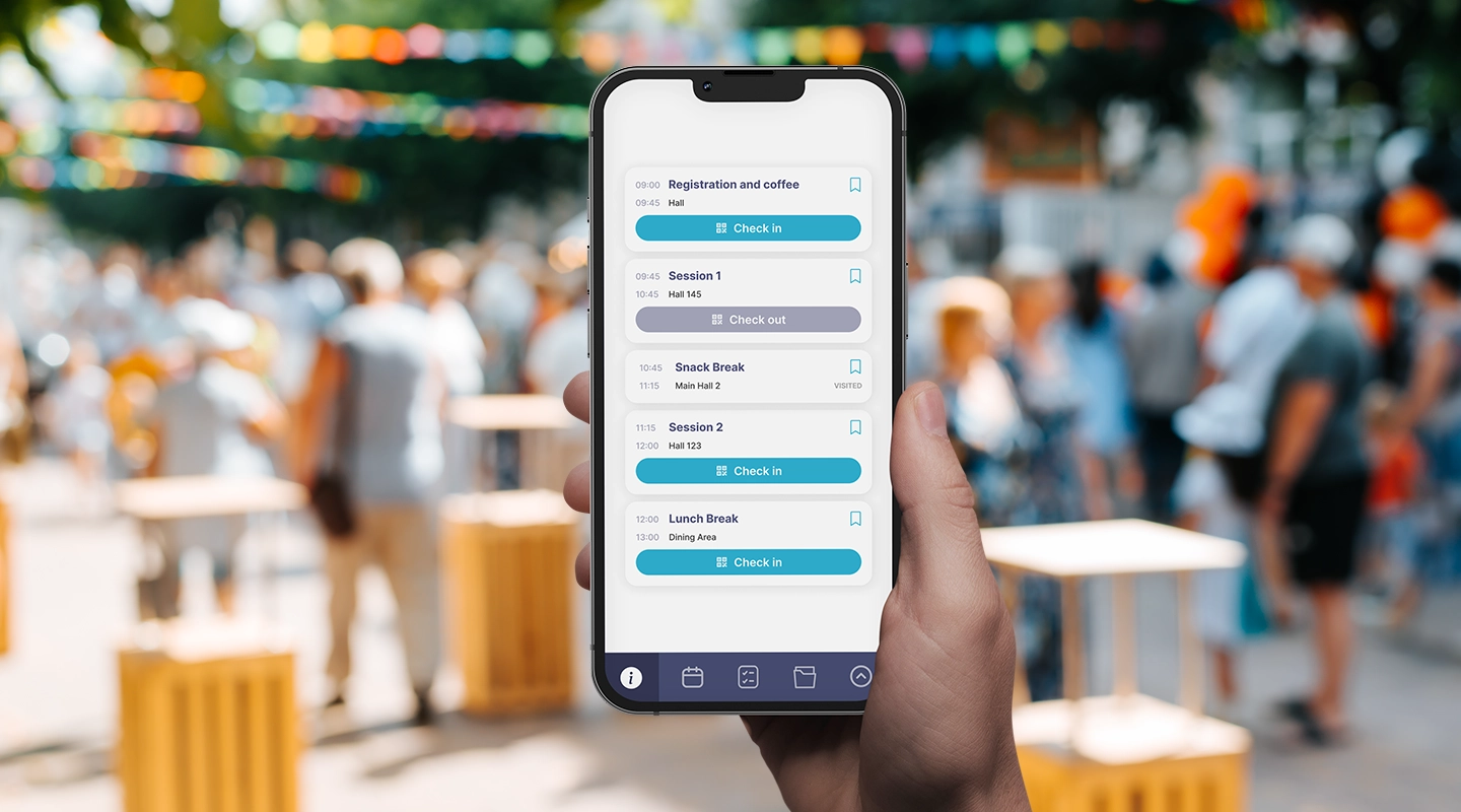 Staff members using a QR code event check-in app to manage attendee entry