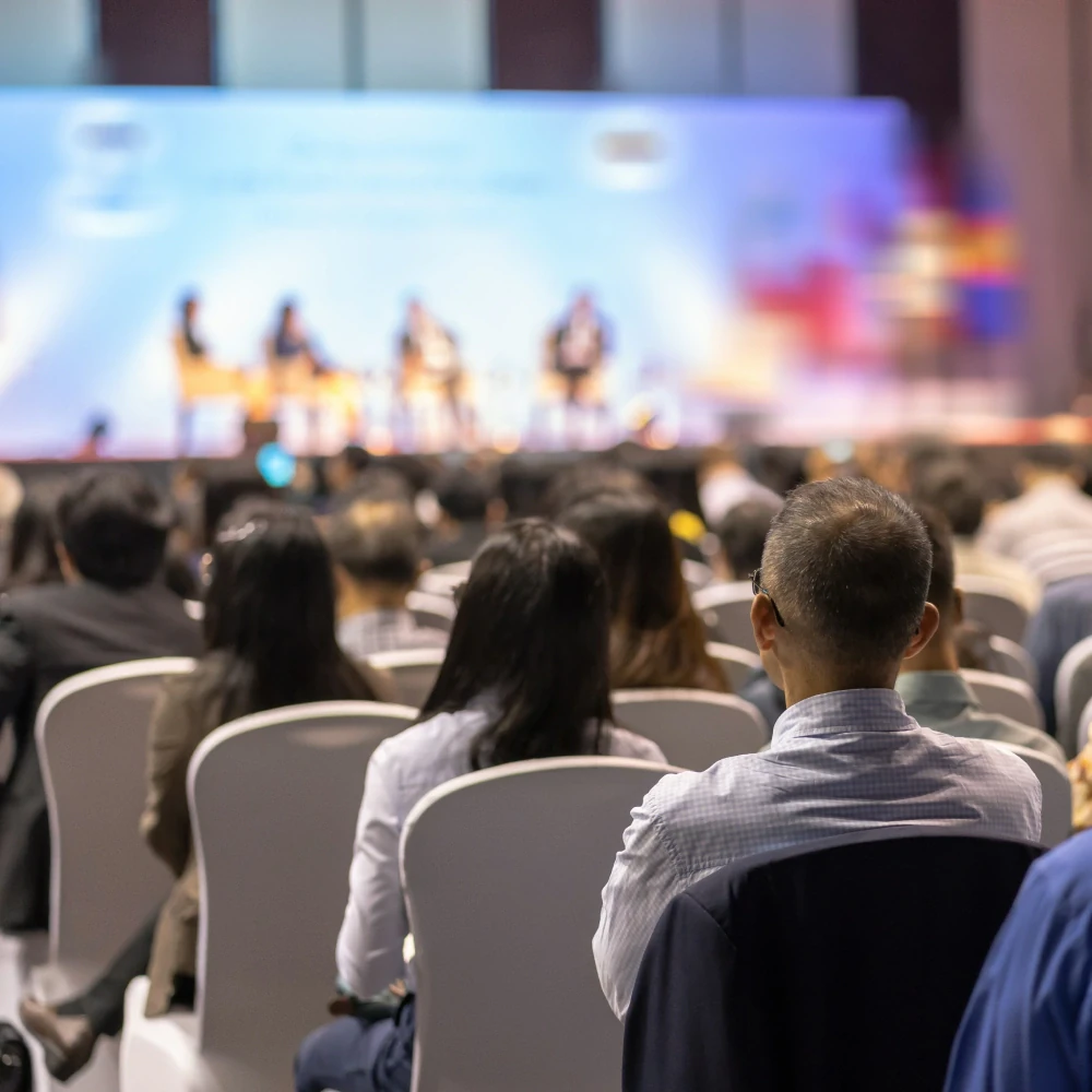 Conference hall with professional setup and engaged audience